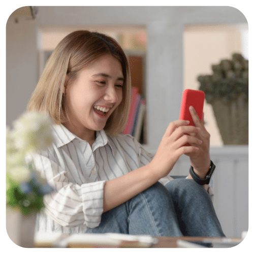 Buzz Marketing – Woman Smiling while Holding Her Phone